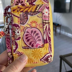 Vera Bradley I D holder: wallet.  Yellow, cranberry, and pink.